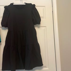 English factory black dress with eyelet puff sleeves. Size small. Good condition